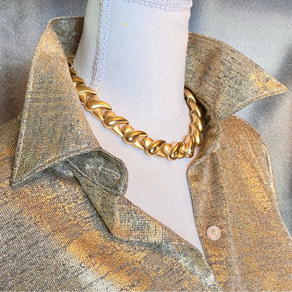 Erwin Pearl 17” choker, signature clasp, and John Eshaya blouse included.